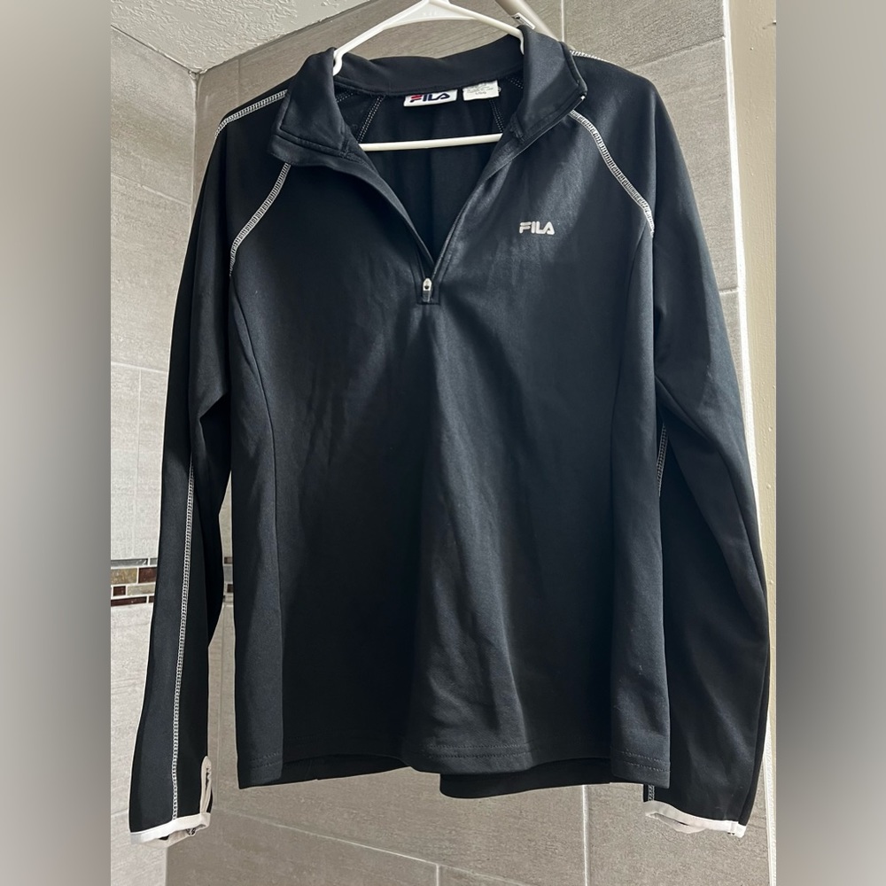 Fila size large women’s zip top athletic jacket. New but without tags!
